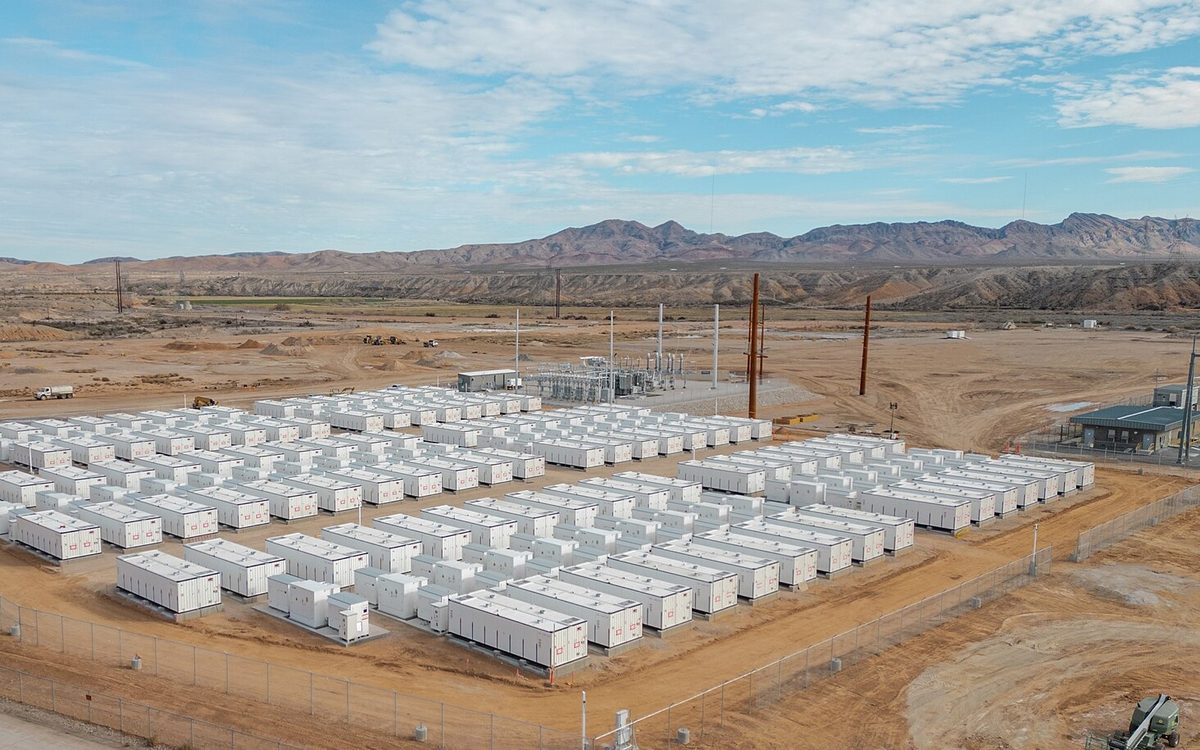 Rows of battery energy storage containers at a utility-scale installation