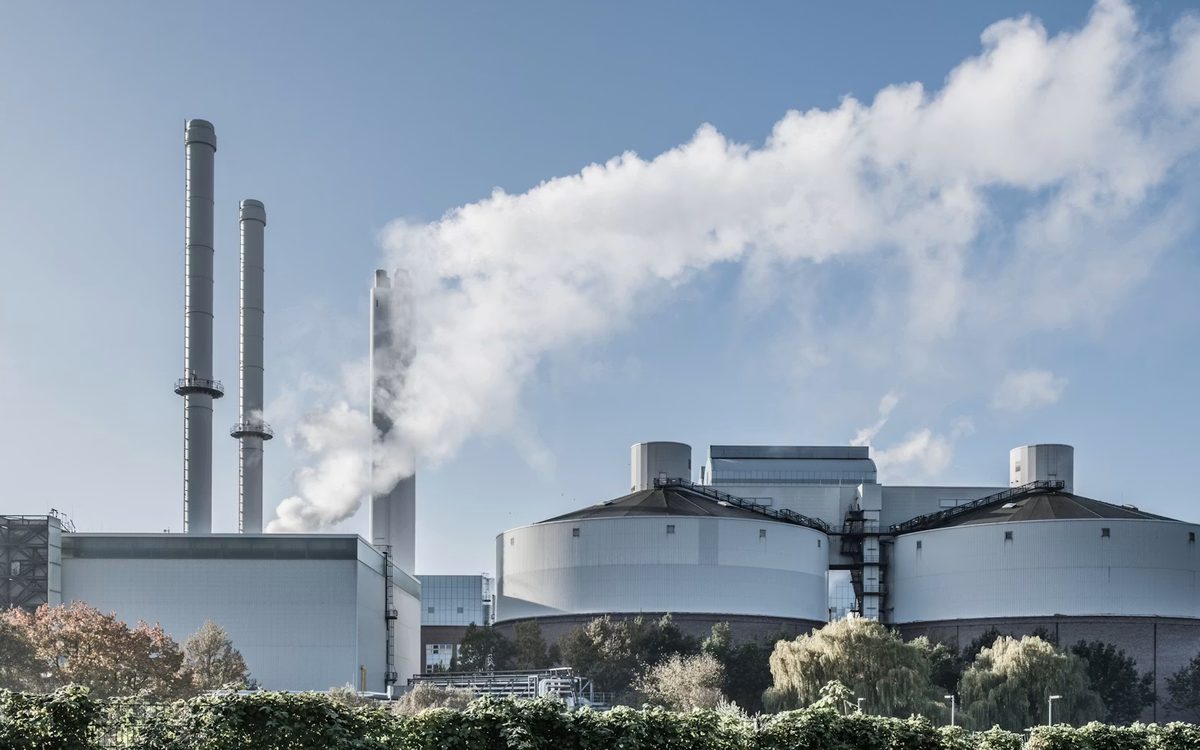 A waste-to-energy plant with its stacks and process buildings