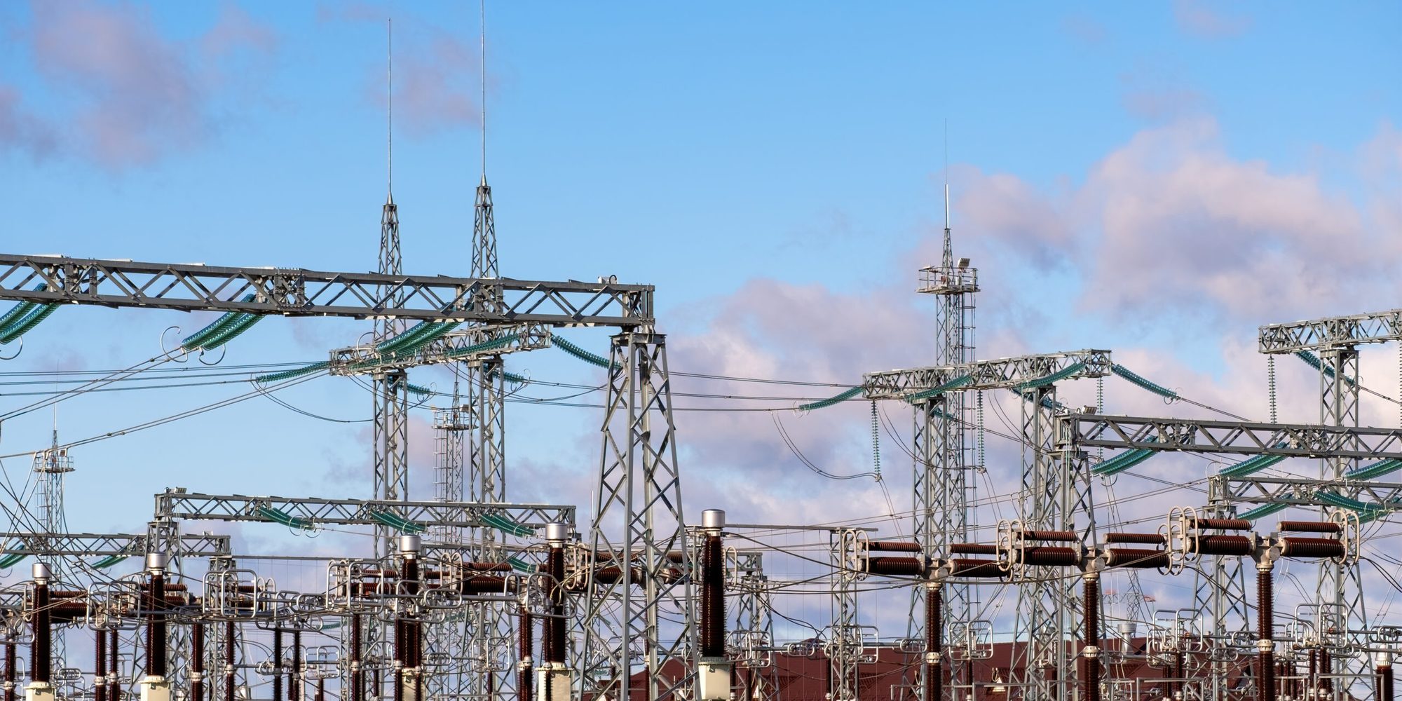 Gantries and conductors at a high-voltage transmission substation