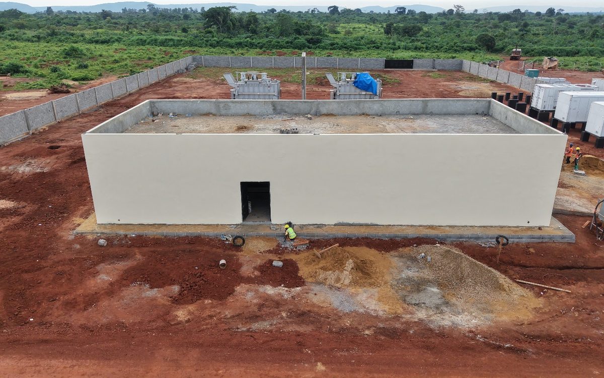 The completed Sakai substation building on cleared red ground