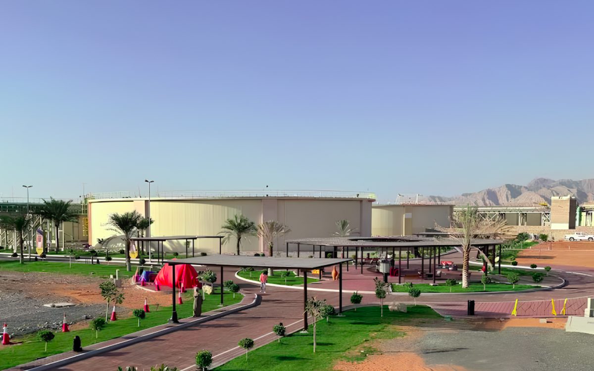 Landscaped grounds and shaded structures at the Saud Bin Saqr Energy and Innovation Park