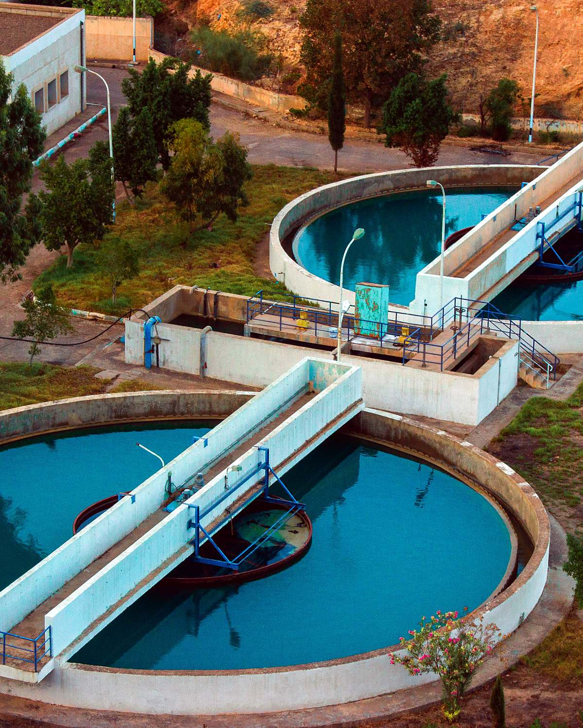Aerial view of circular clarifier tanks at a water treatment works